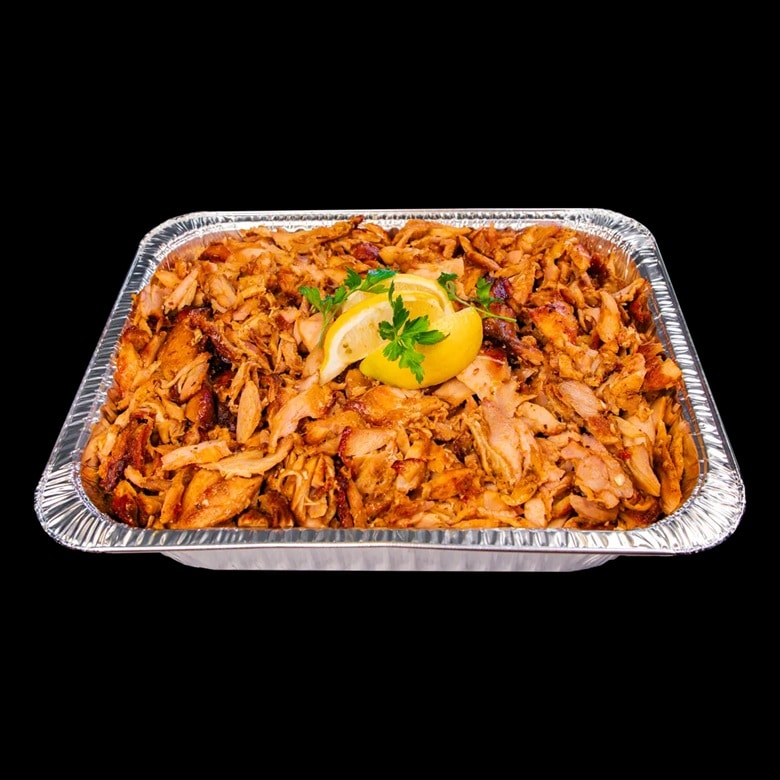 A pan full of gyro meat from The Greek Gyro.